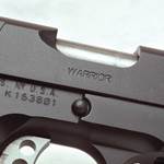 Kimber America Warrior M1911 semi-automatic pistol gun firearm closeup stamping barrel