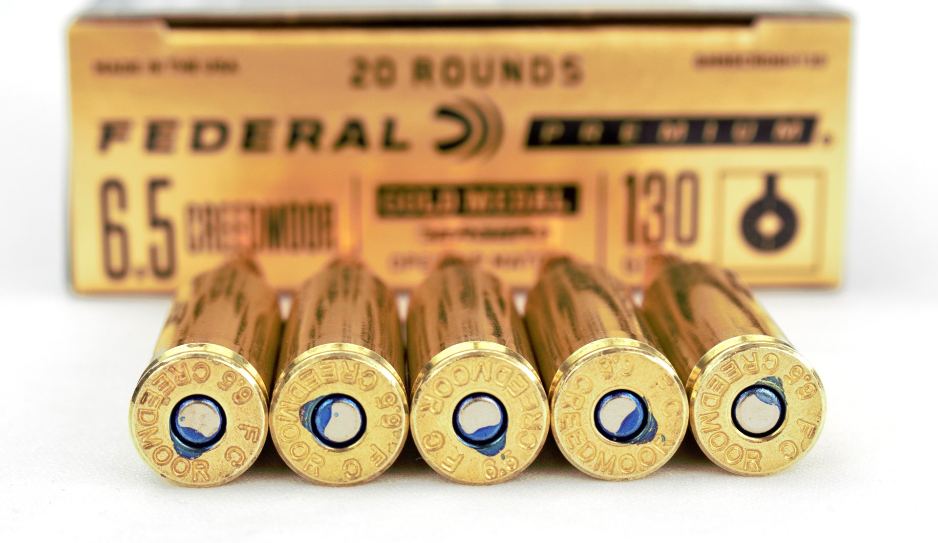 Federal Premium box background with five rounds cartridges 6.5 mm creedmoor bullets ammo casehead focus foreground