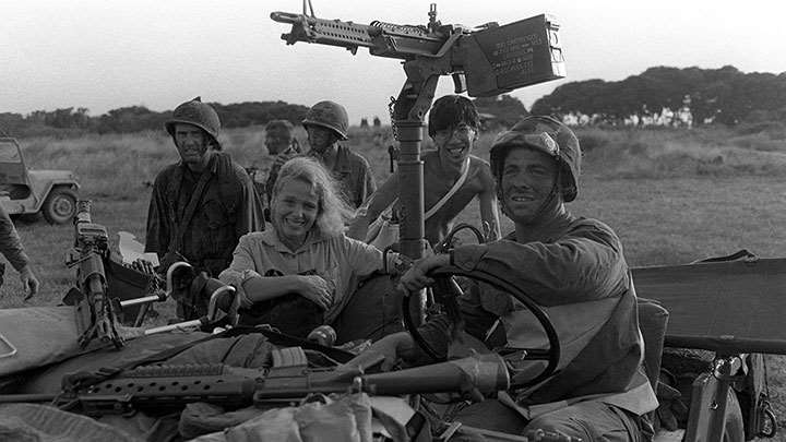 A ride home: a trooper of the 82nd Airborne behind the wheel of an M151 1/4-ton utility vehicle (the “Mutt”), featuring an M60 on the pedestal mount.