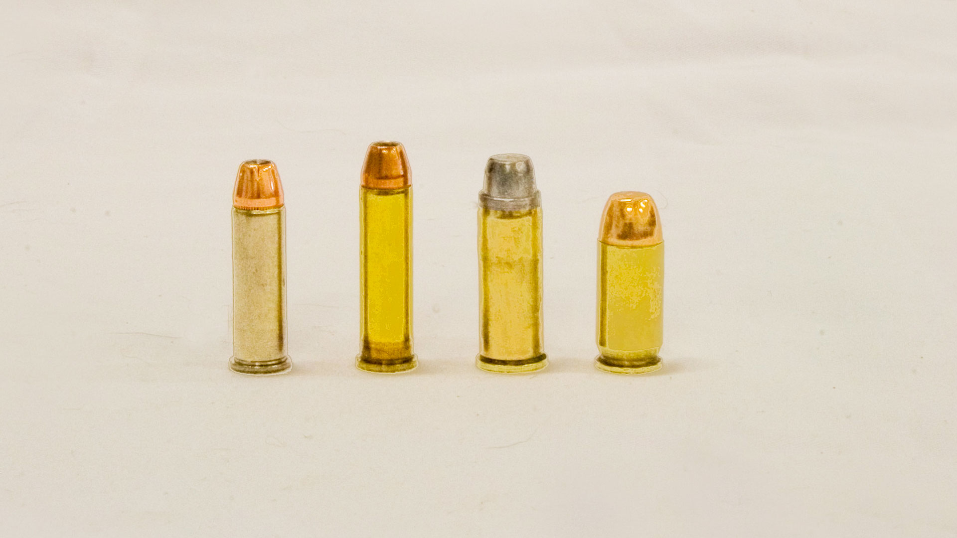 A size comparison between, from left to right, .38 Spl., .357 Mag., .44 Spl. and .45 ACP.
