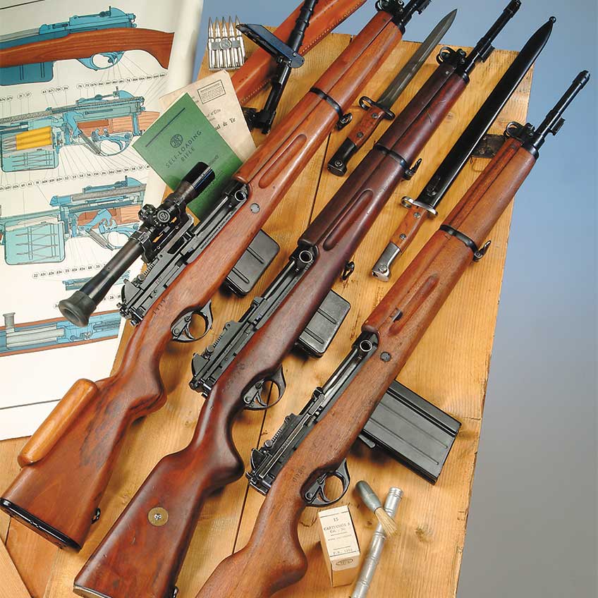 Dieudonne Saive’s FN-49 rifles were sold to at least 26 nations. Shown here with a host of accessories are (l. to r.) an FN-49 rifle shipped to Luxembourg with a 4X OIP riflescope, a three-swivel FN-49 procured by Egypt and an Argentinian FN-49 with Argentina’s 20-round magazine conversion.