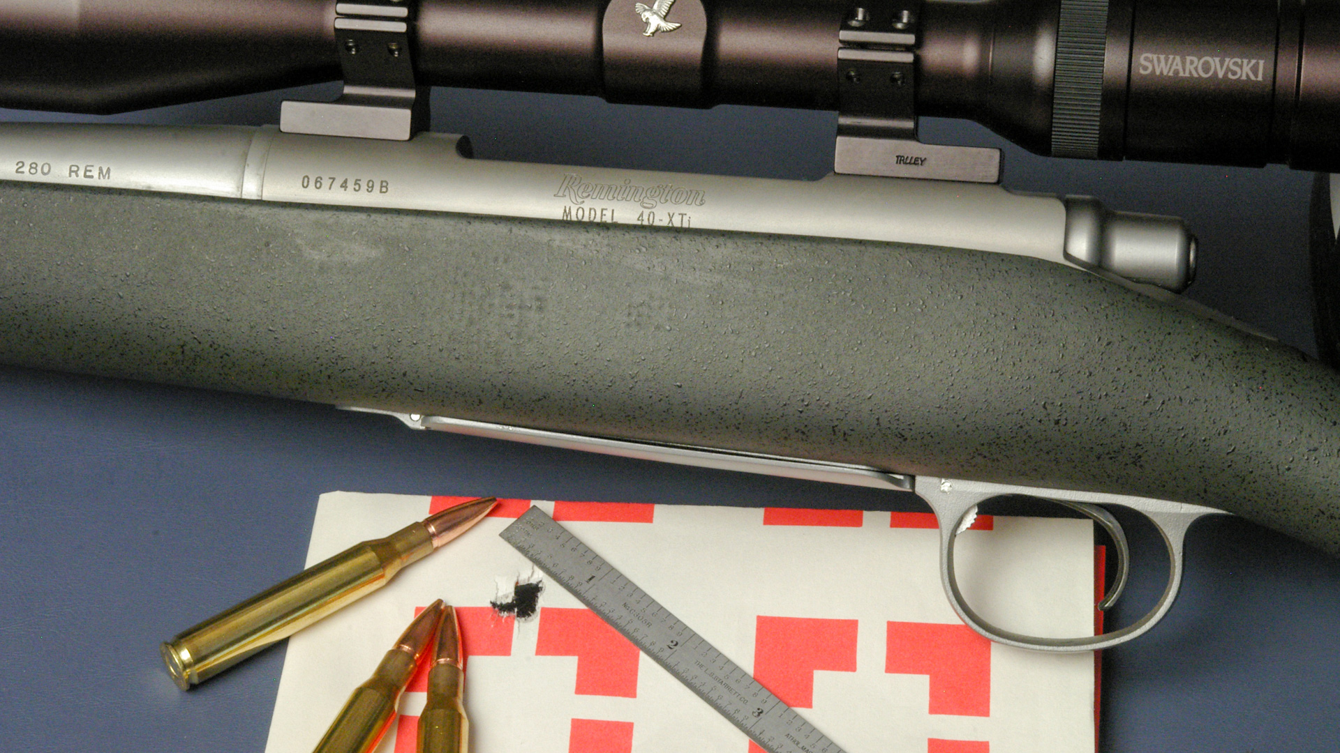 Rifle with ammo and ruler