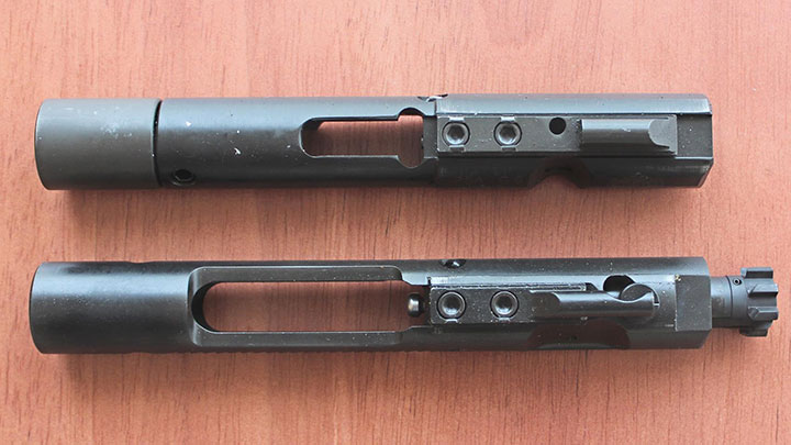 A standard pistol-caliber AR style bolt carrier group on top versus the Mk9 RDB bolt carrier group on the bottom.