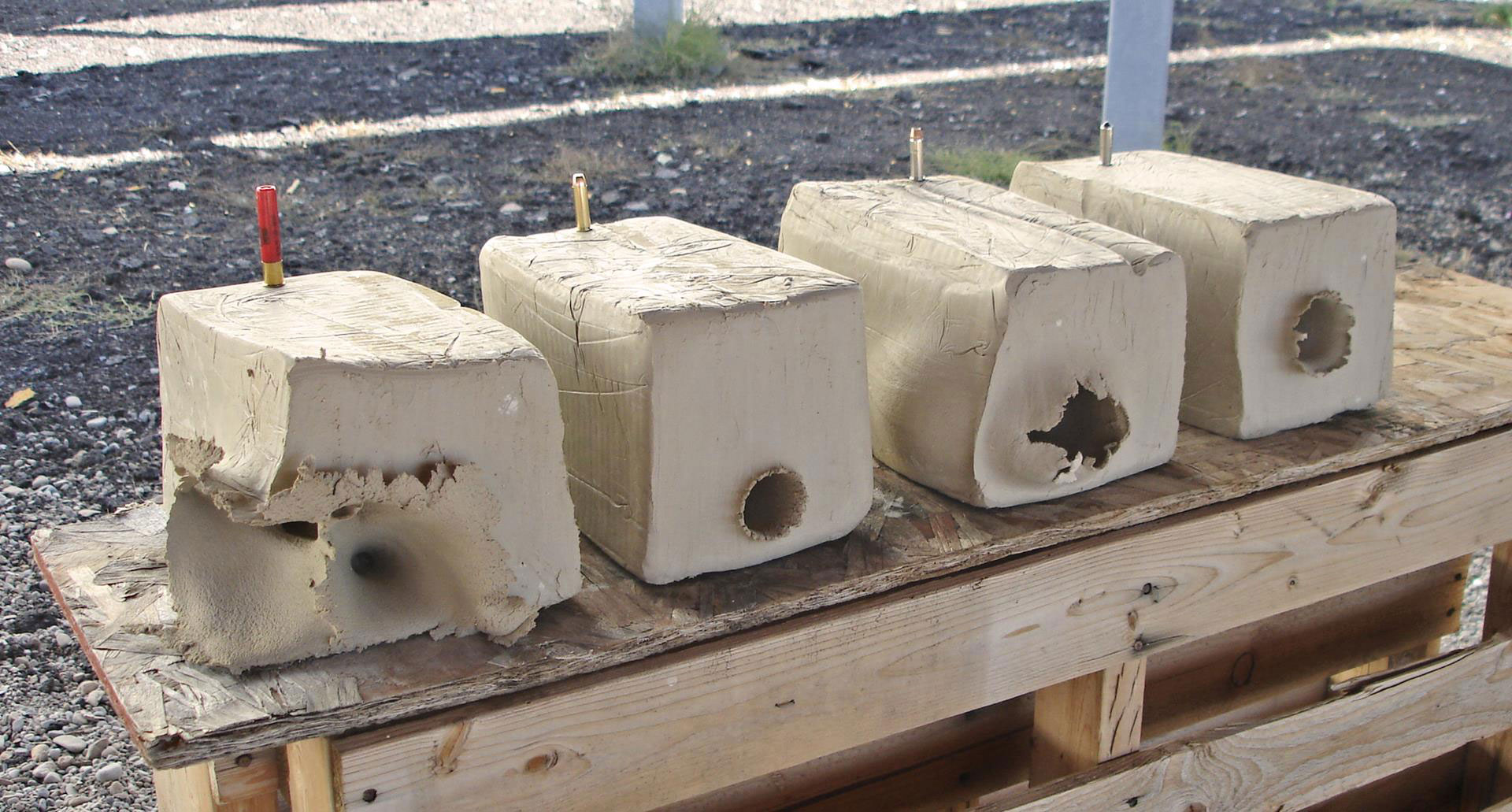 These four 25-lb. pottery clay blocks have been shot with three different types of .45 Colt bullet and one .410 bore buckshot load (far left).