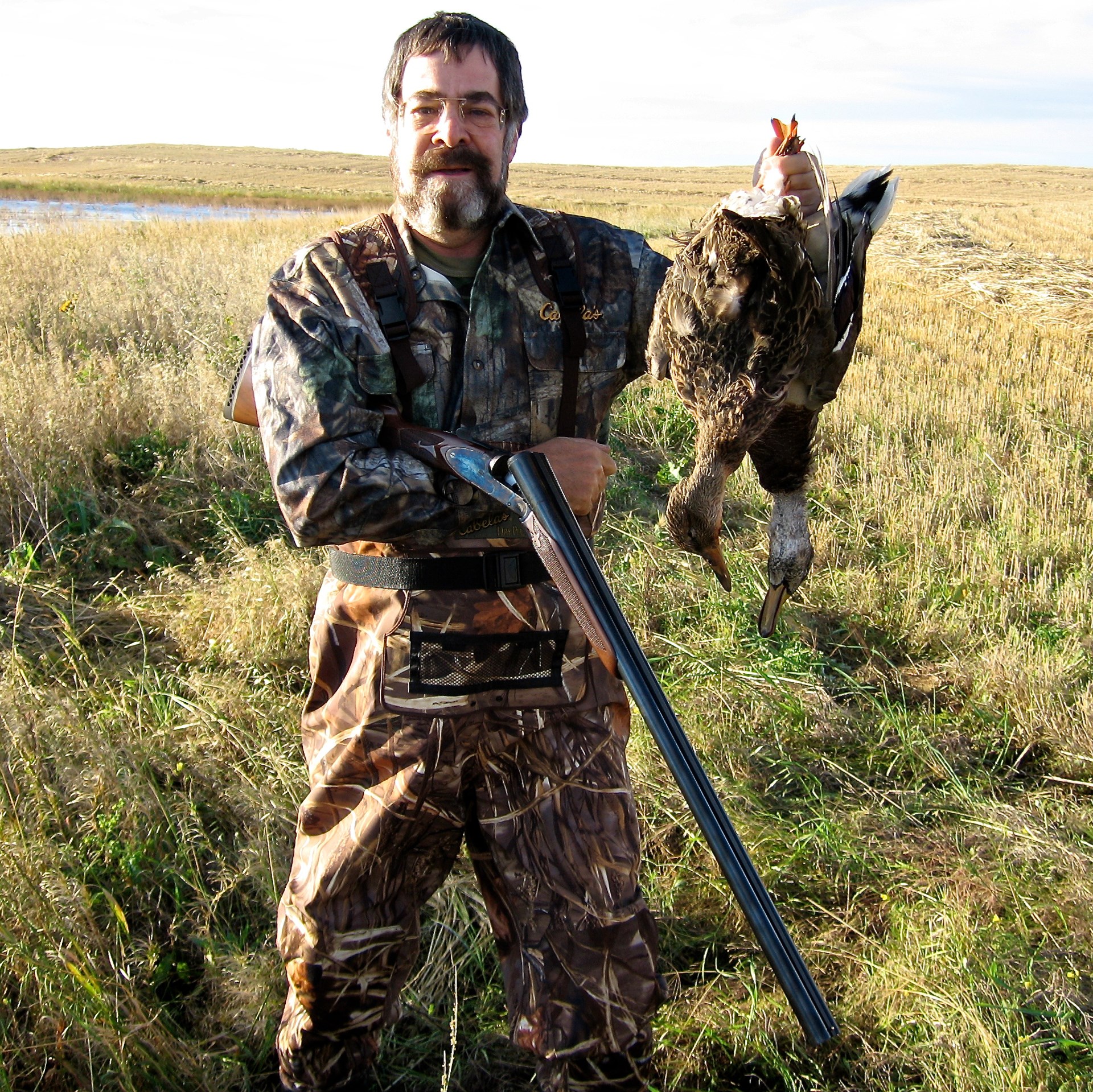 Man outdoors weilding shotgun and ducks On an Alberta, Canada, duck hunt, Hacker used Marlin’s Italian-made Fausti Stefano boxlock interpretation of an L.C. Smith with faux sidelock plates to make a double on ducks. The gun, no longer made, performed well and may still be available on the secondary market, but it doesn’t have the collectability of the original L.C. Smith sidelocks.