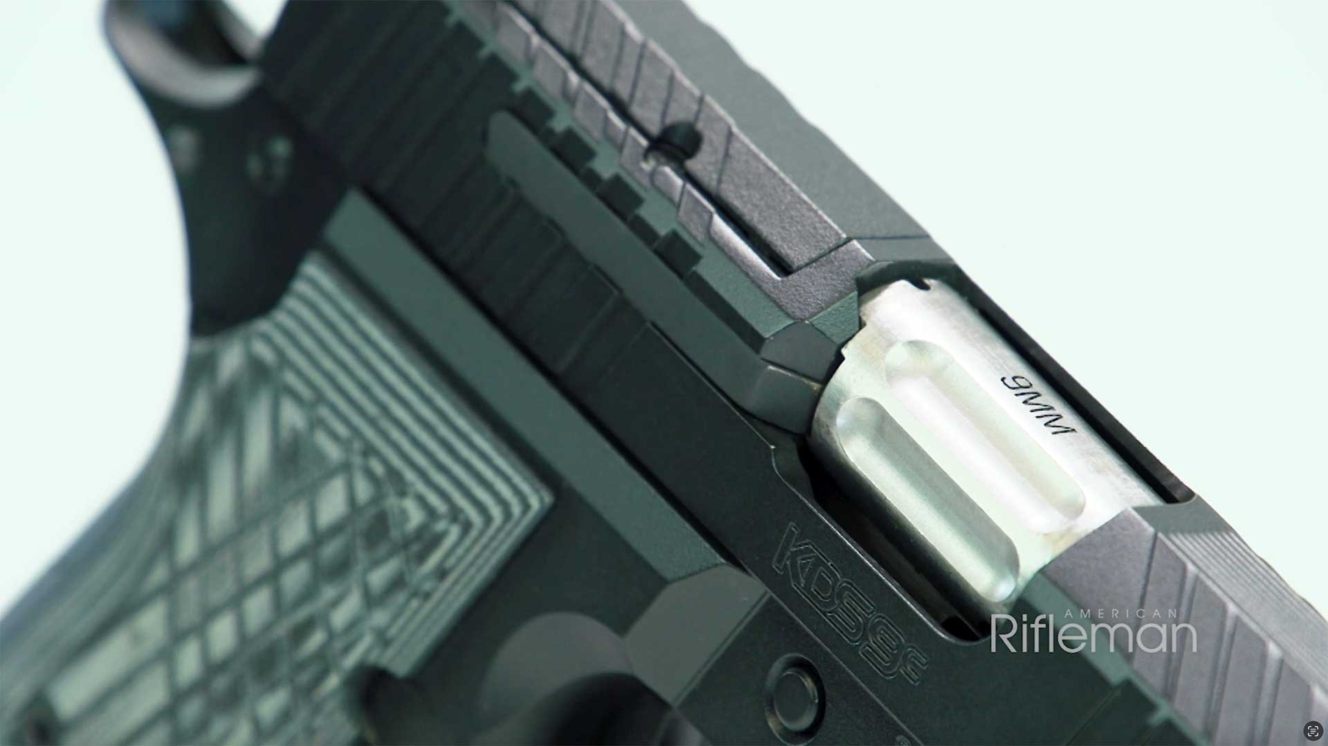 Detail shot of the right side of the Kimber KDS9c, showing the extractor and ejection port.