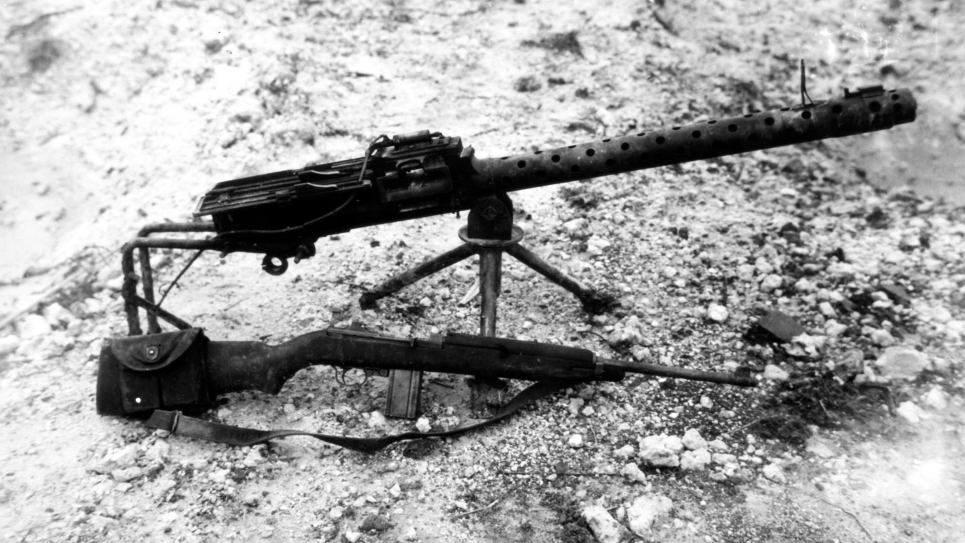 Type 97 Japanese machine gun on tripod next to M1 carbine