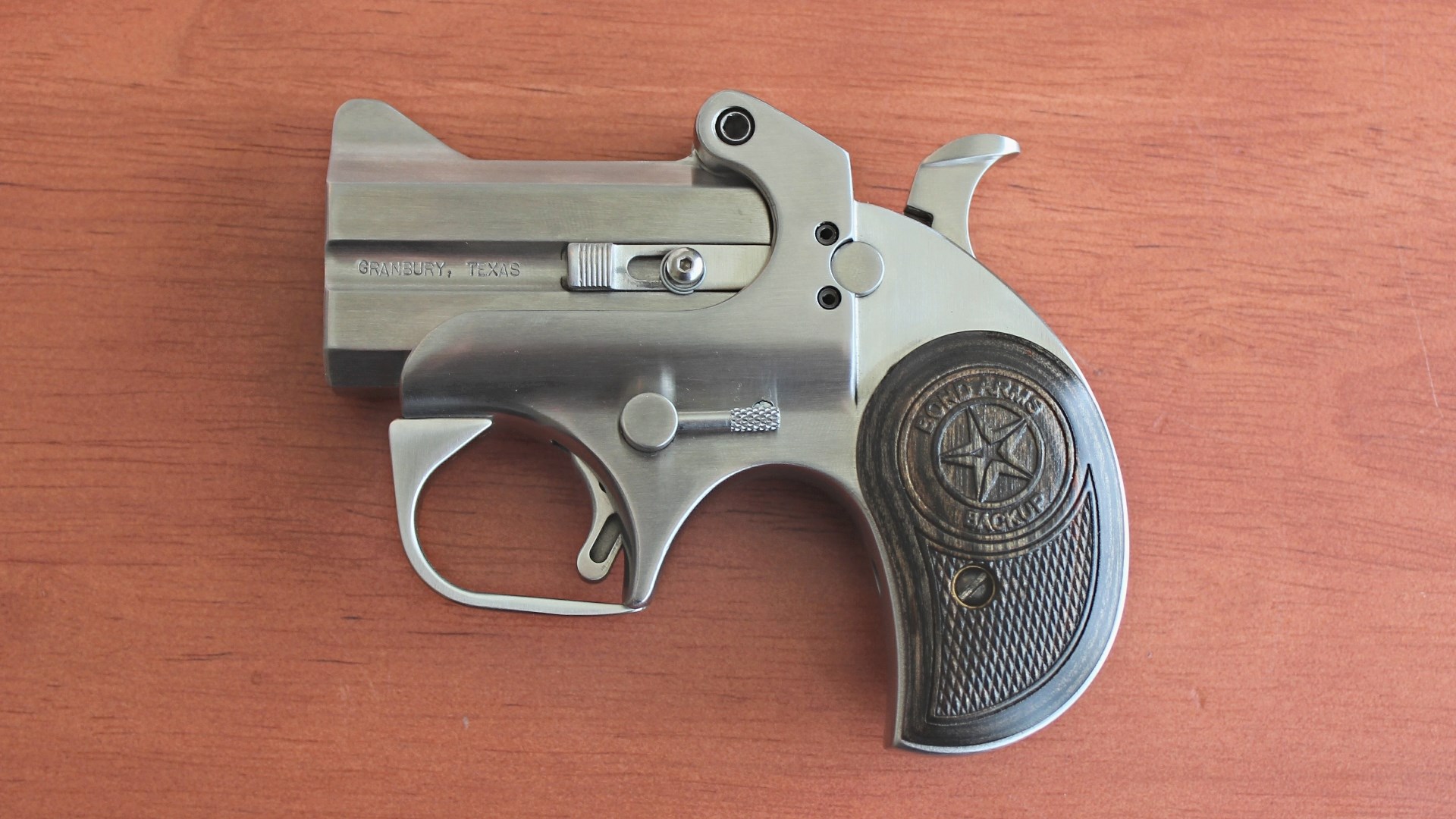 Right side of a Bond Arms derringer with a 3-inch barrel.