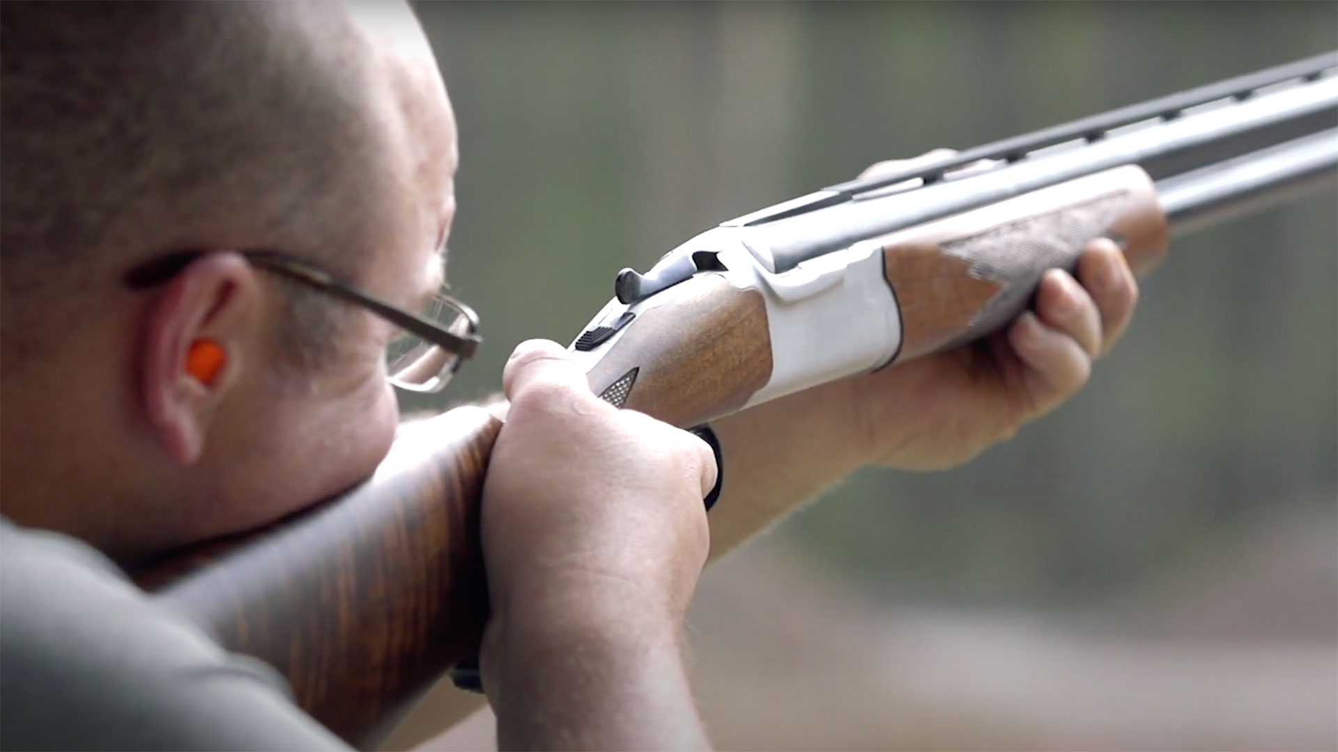 Shooting a Ruger Red Label on the range.