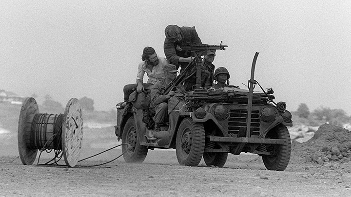M151 “Mutt” sporting a pair of M60 machine guns, as well as a wire-cutting bar attached to the front grill.