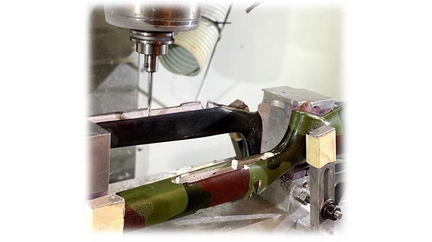 machine closeup gunsmith riflestock manufacturing factory gun rifle