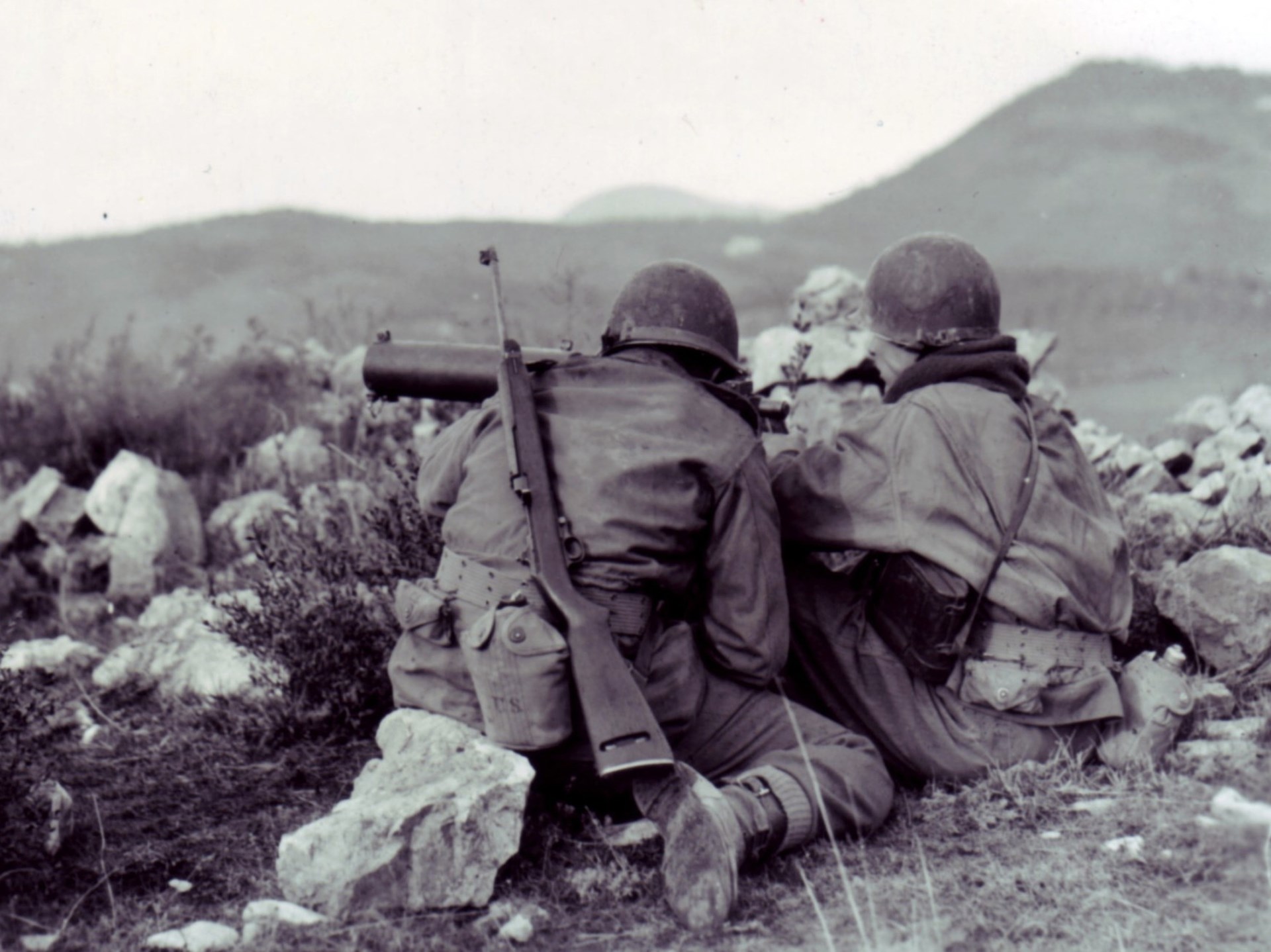 The Browning M1917A1 .30 caliber machine in action near Filetole. Note the assistant gunner is armed with an M1 Carbine.