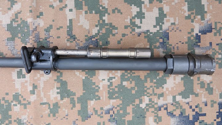 The ARX 100 quick-detachable barrel removed to show the gas piston system.