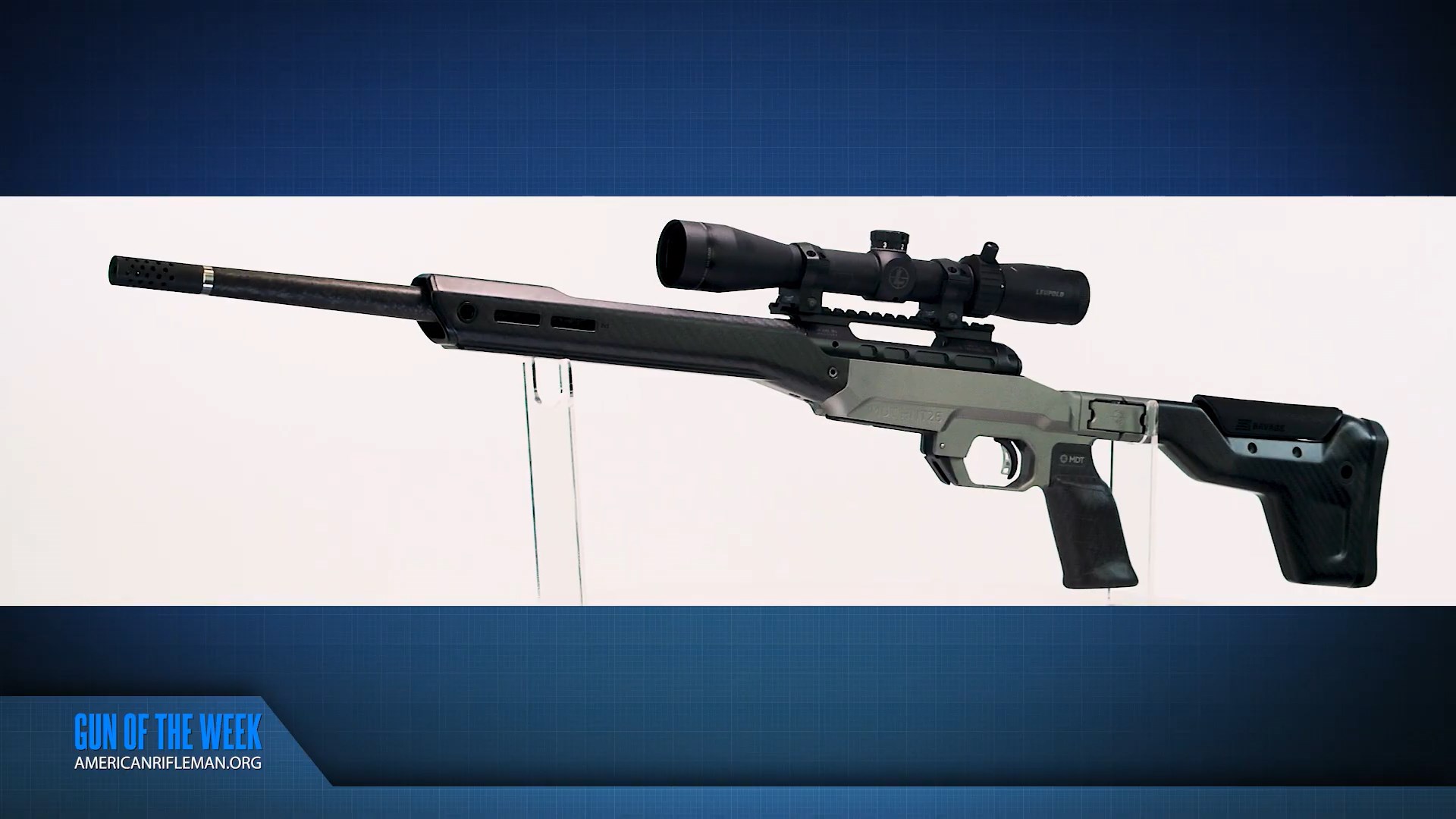 Savage Arms Model 110 Ultralite Elite bolt-action rifle shown left-side view MDT HNT26 chassis PROOF Research carbon-fiber barrel leupold optic attached on clear acrylic stand white background mixed with blue grid overlay