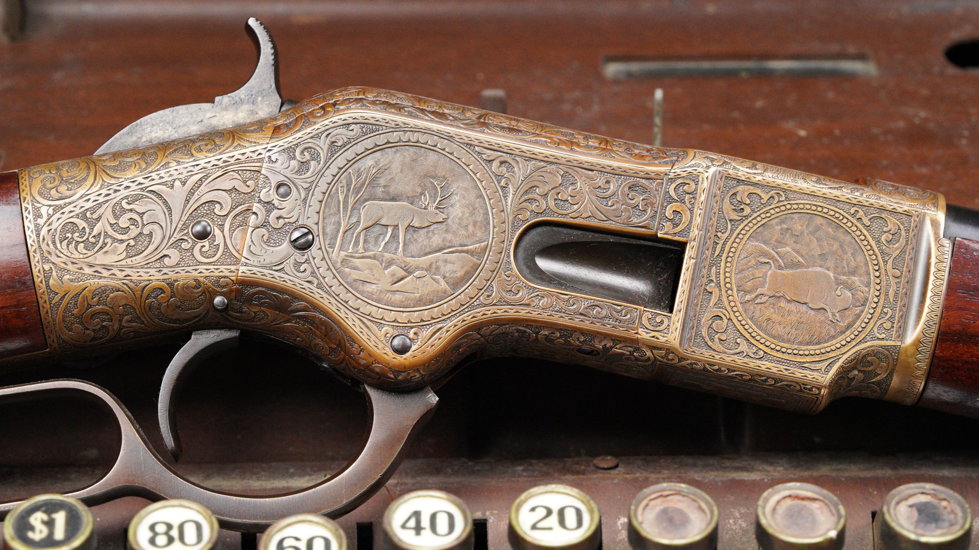 An early, possibly Ulrich-engraved Winchester Model 1866 saddle ring carbine lever action – one of two 1866 Winchesters to be auctioned.
