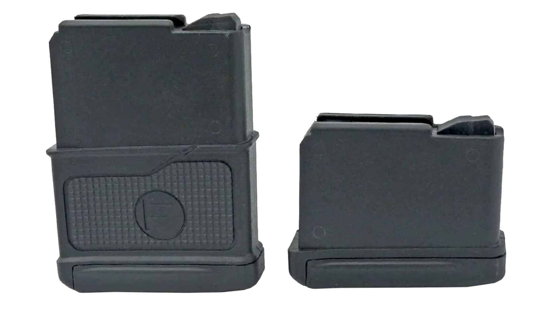 two black plastic polymer rifle magazines stack row collumns