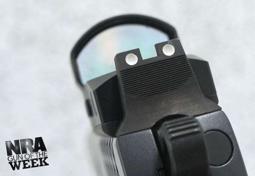 Pistol slide hammer steel metal glass optic text on image