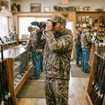 Hunter in gun store