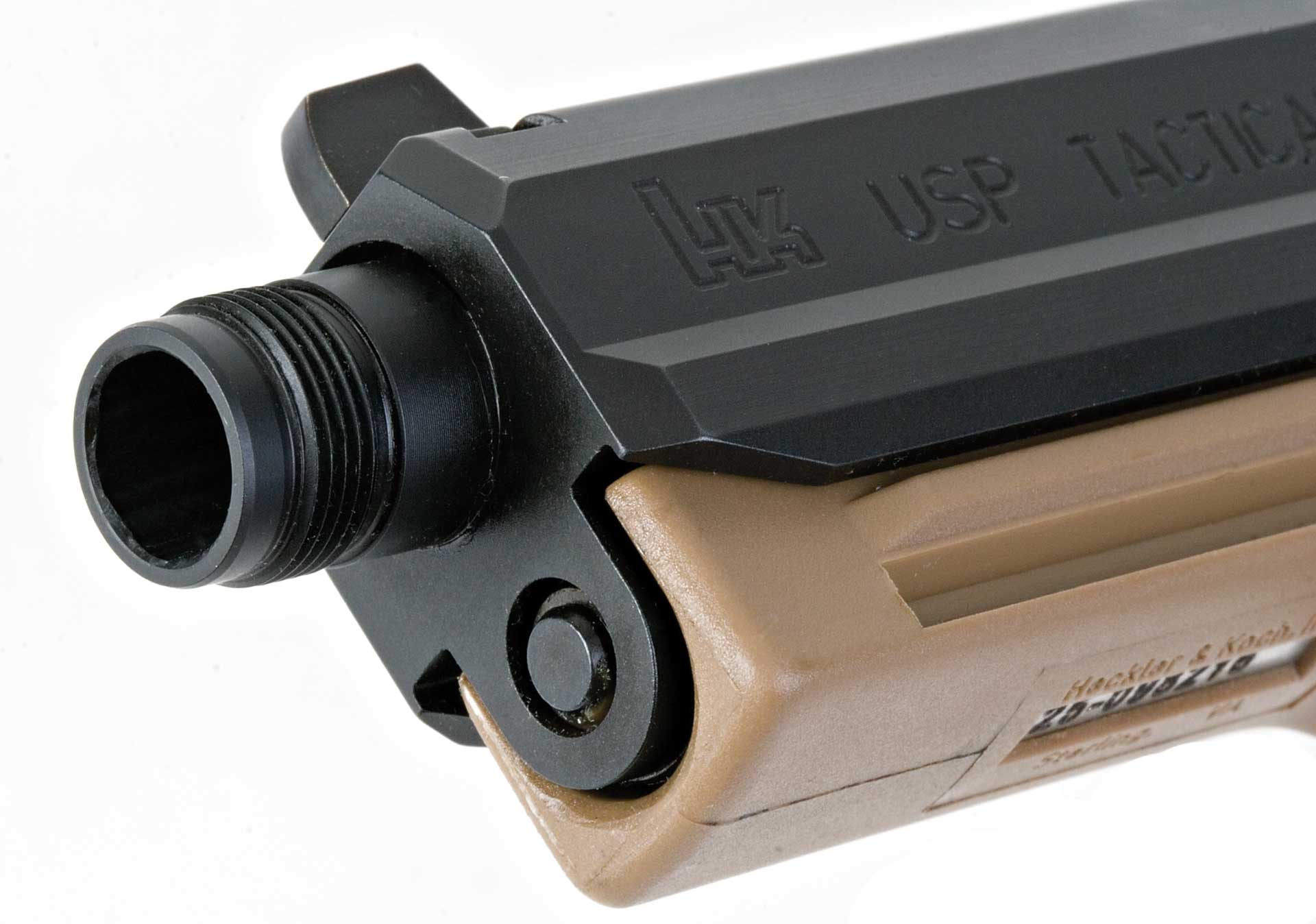 H&K USP Tactical .45 pistol muzzle barrel slide metal steel black tan plastic frame accessory rail