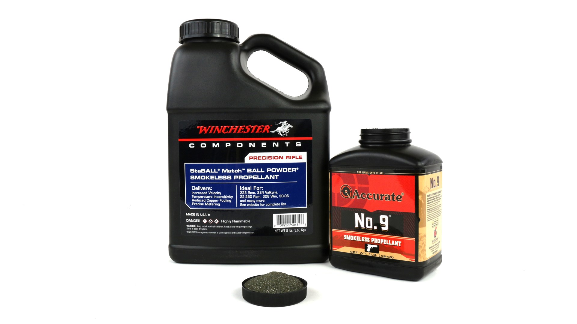 Winchester black powder jug next to accurate no. 9 powder jug with cap of gunpowder shown front and center