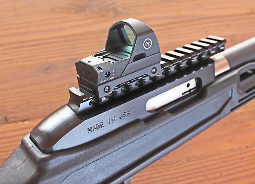 closeup receiver reflex sight picatinny rail gun action made in usa stamp