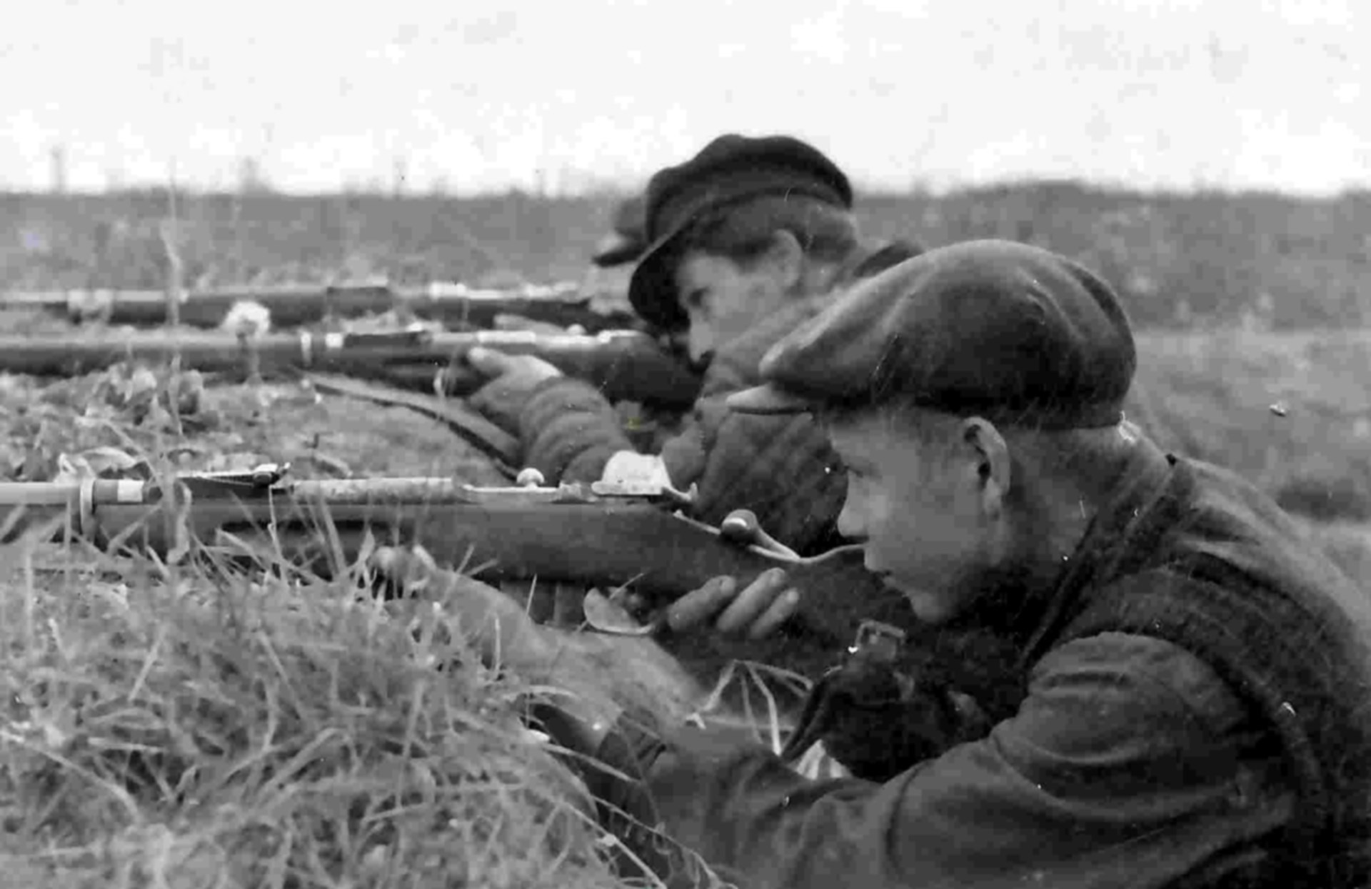 Total war on the Eastern Front knew no age limit. Shown here, a youthful partisan sights his M1891 Mosin-Nagant rifle. NARA