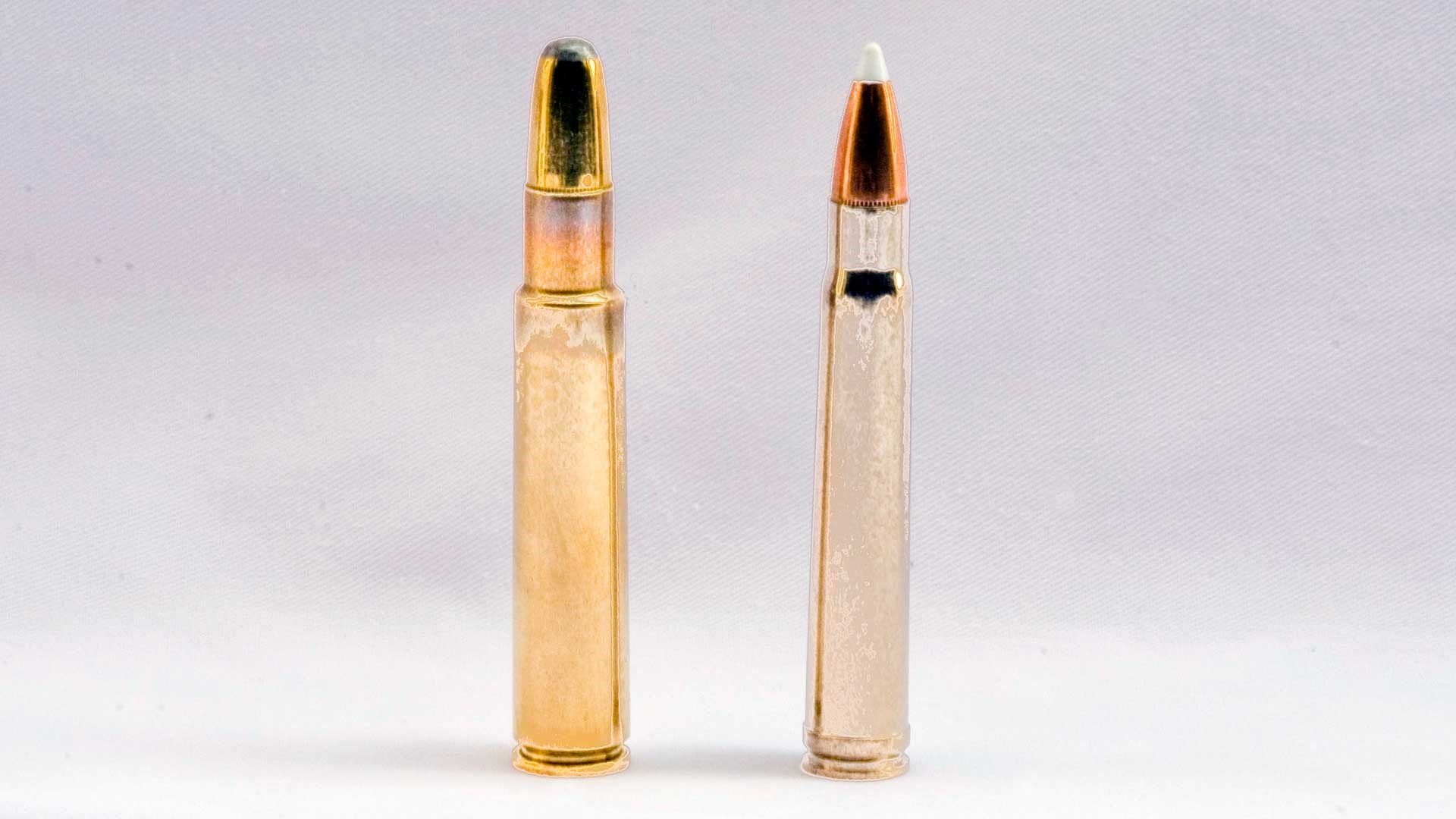 The .416 Rigby, left, is shown next to a .375 Holland & Holland cartridge.