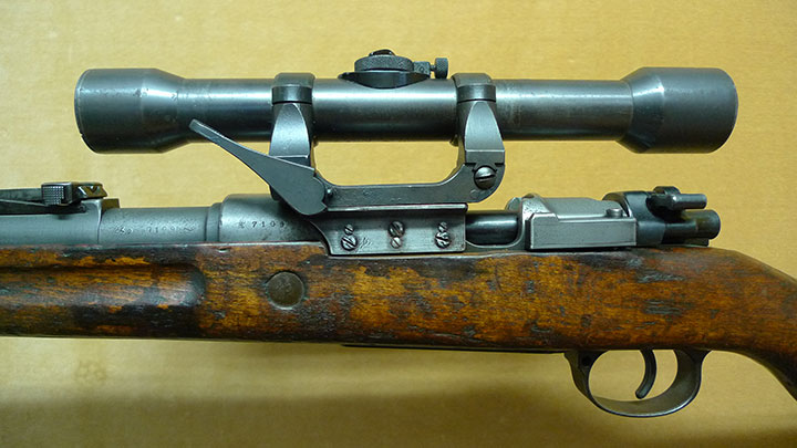A modified Gew.98, fitted with a short-side rail scope and mounts. This is an early SS issue rifle.