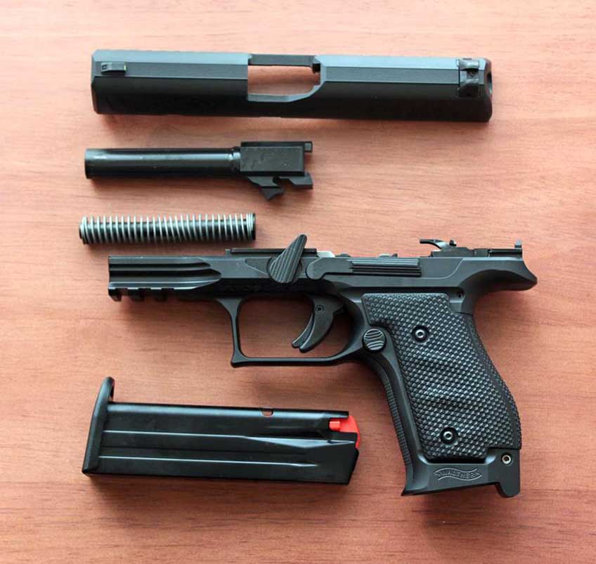 walther arms q4 steel frame pistol handgun disassembled exploded view parts frame barrel spring slide magazine