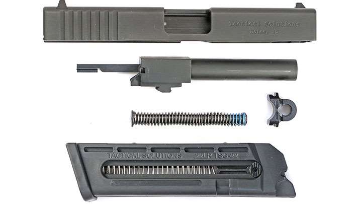 The components of a Tactical Solutions TSG-22 .22 LR conversion unit disassembled. The slide and magazine can be further disassembled to allow a thorough cleaning, a critical feature for a reliable .22 conversion.