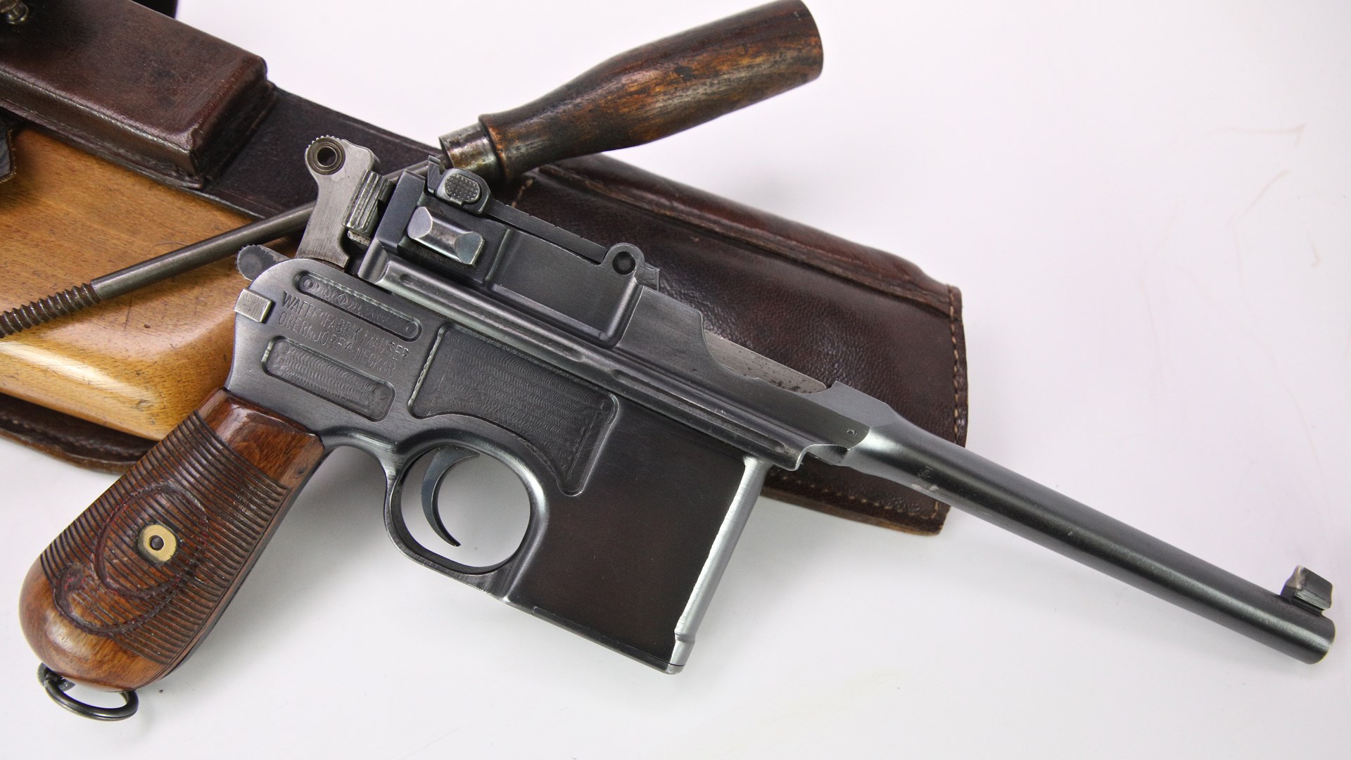 A correct WWI Mauser C96 Broomhandle Red Nine 9mm pistol with shoulder stock.