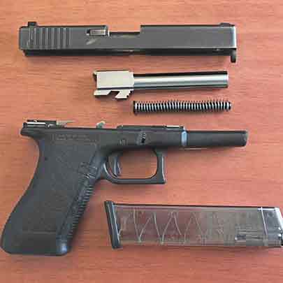 The surplus G22 with conversion kit and replacement parts, disassembled.