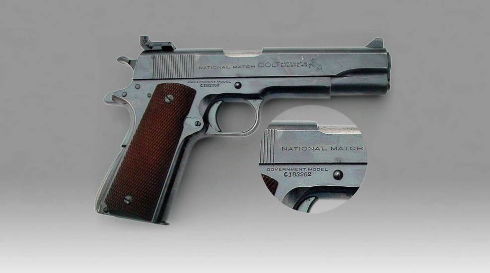 Colt National Match 1911 pistol closeup serial numbers handgun governement model