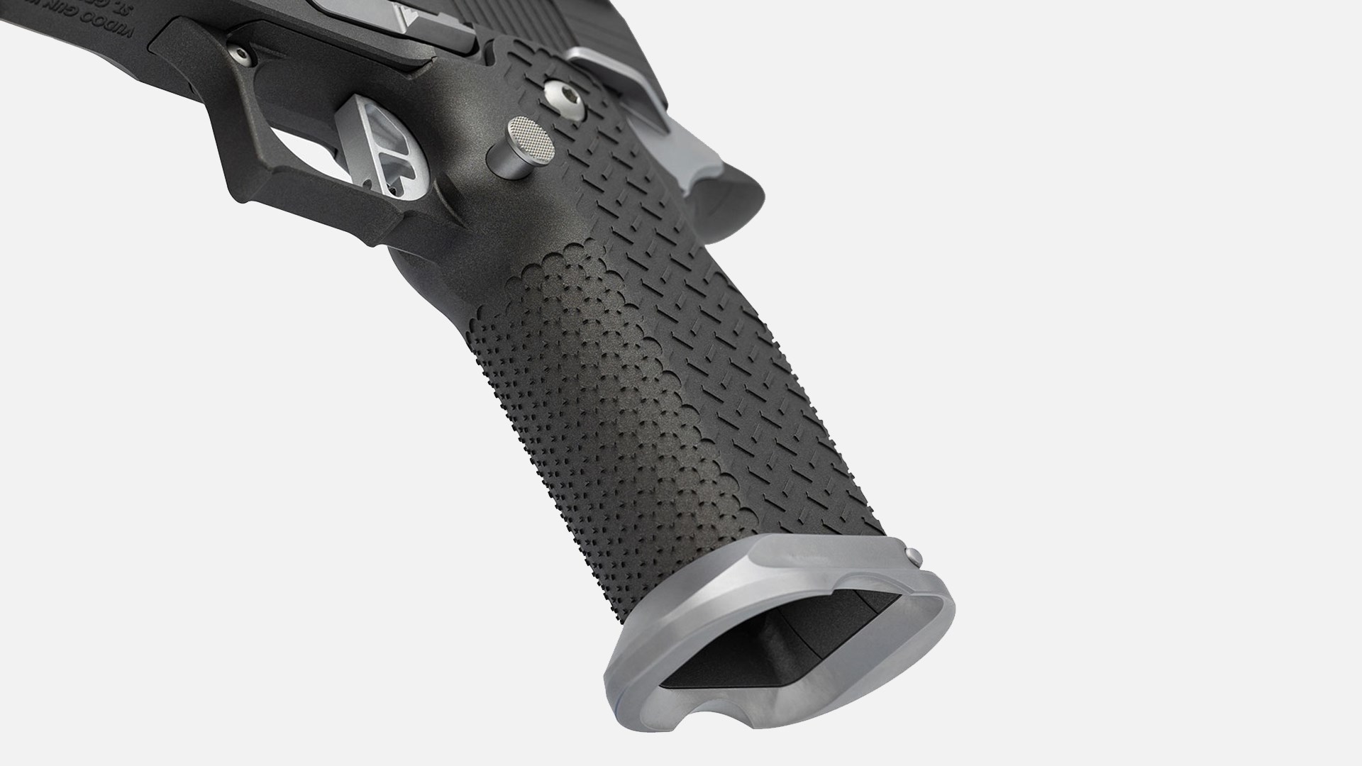 A close-up of the double-stack magazine well on the all-black Vudoo Priest pistol.