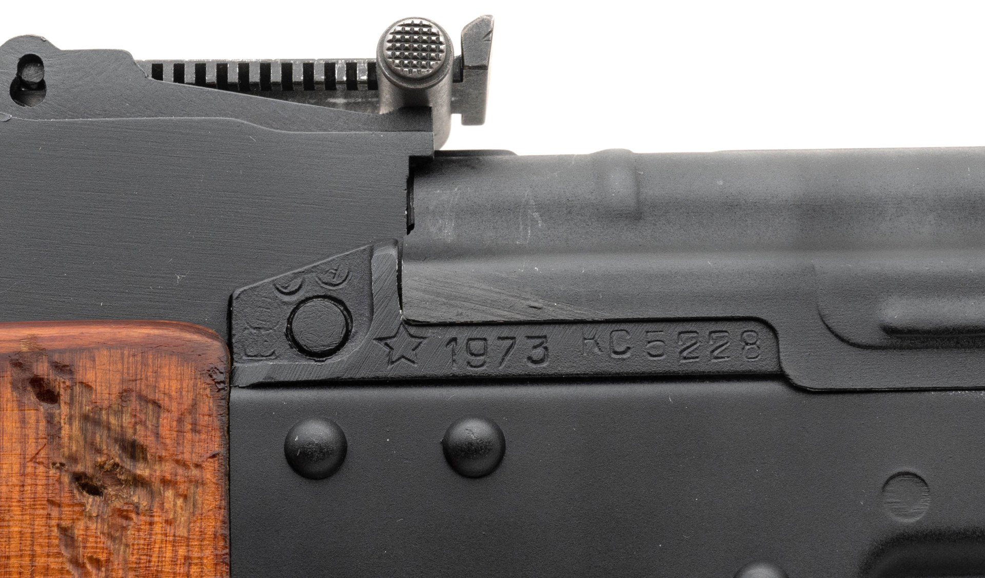 Left side close-up of the front trunnion markings on a 1973 Tula AKM semi-automatic parts kit built using a Childers receiver. Photograph by Jeff Hallinan of Collectors Firearms in Houston, Texas.