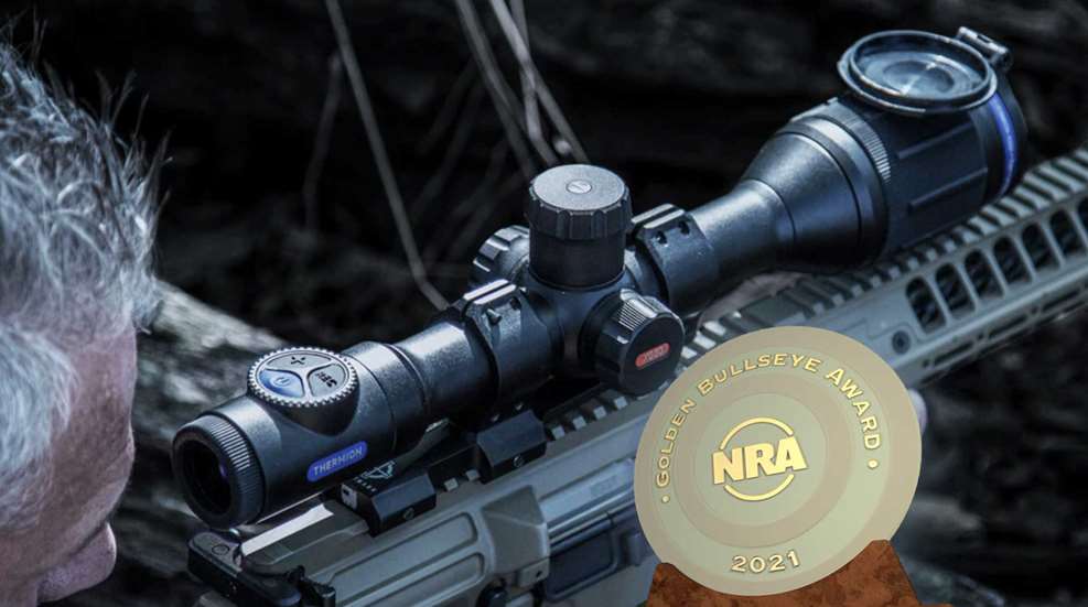 man shooting rifle hunting scope award gold trophy NRA