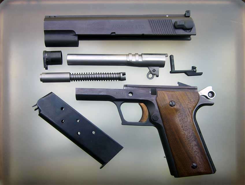 Arminex TriFire pistol shown disassembled.