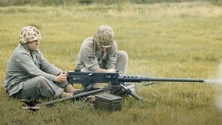 Reenactors dressed as World War II era U.S. marines fire the Browning M2.