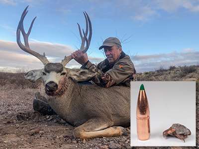 author with the mule deer buck