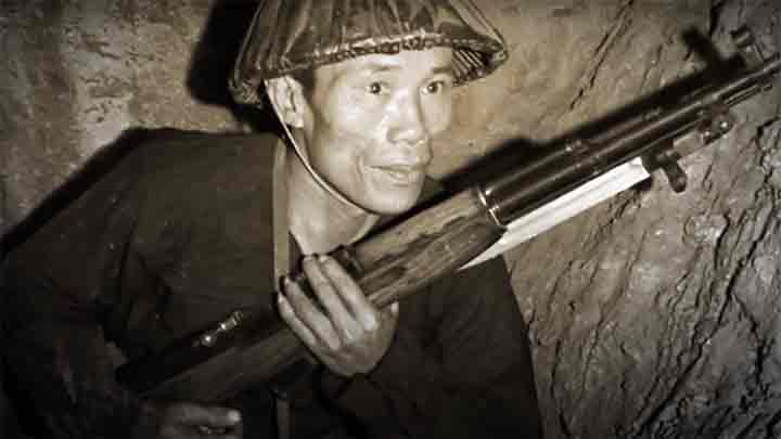 A guerrilla armed with a Chinese variation of the SKS-45 during the Vietnam War.
