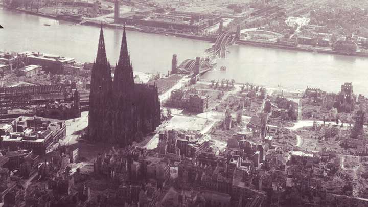 Aerial recon photo of bombed out Cologne. Despite the bombing, shelling and gunfire, the cathedral remained standing.
