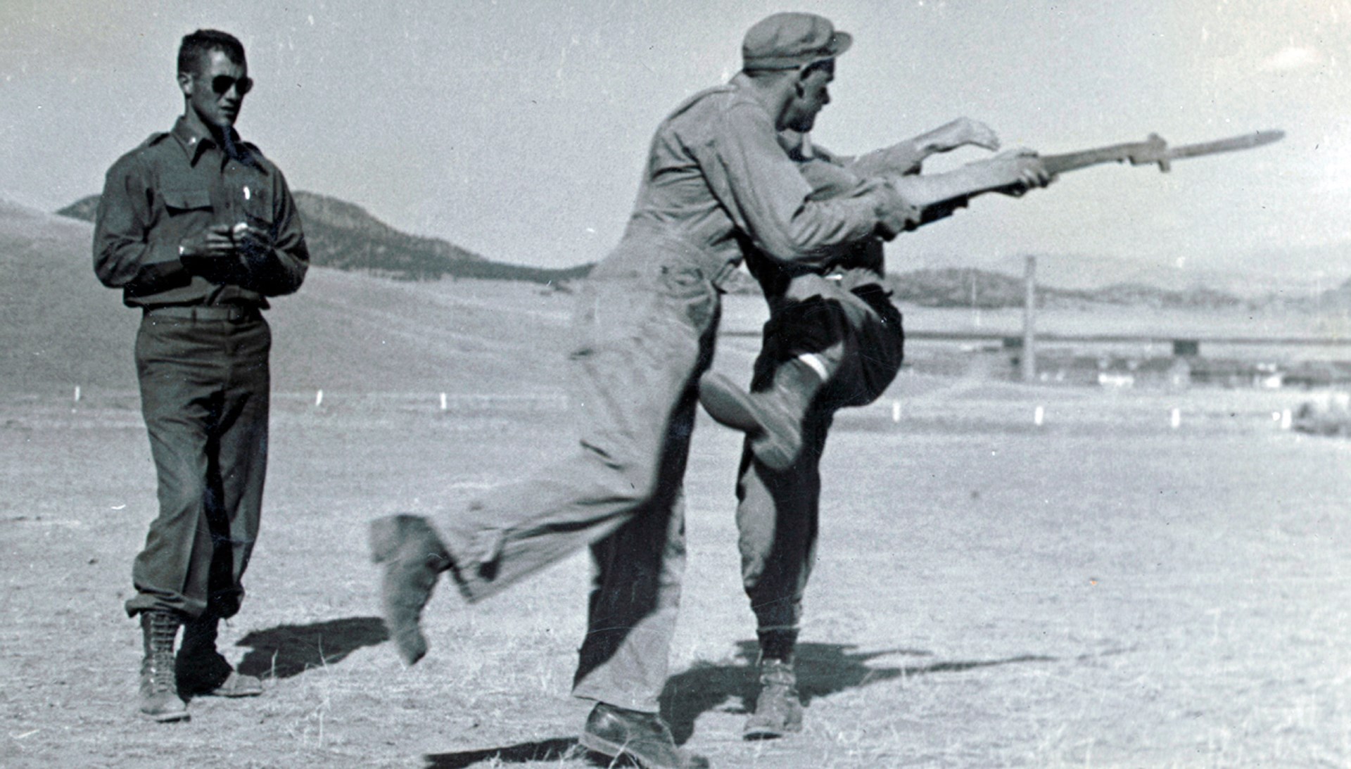 FSSF men in training near Helena, Mont. Note the use of the wooden dummy M1 rifle.  NARA