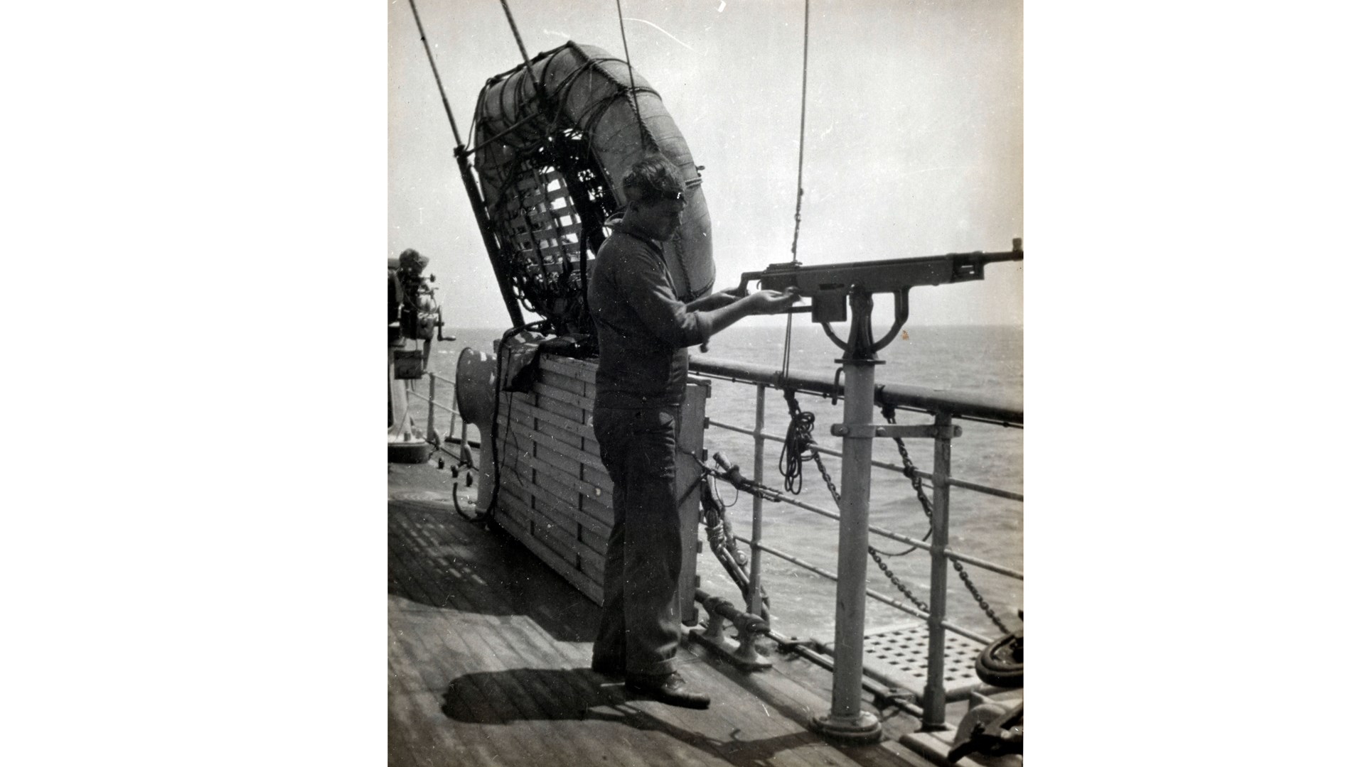 A M1895 in Coast Guard service aboard a converted yacht on anti-submarine patrol during 1918. NARA