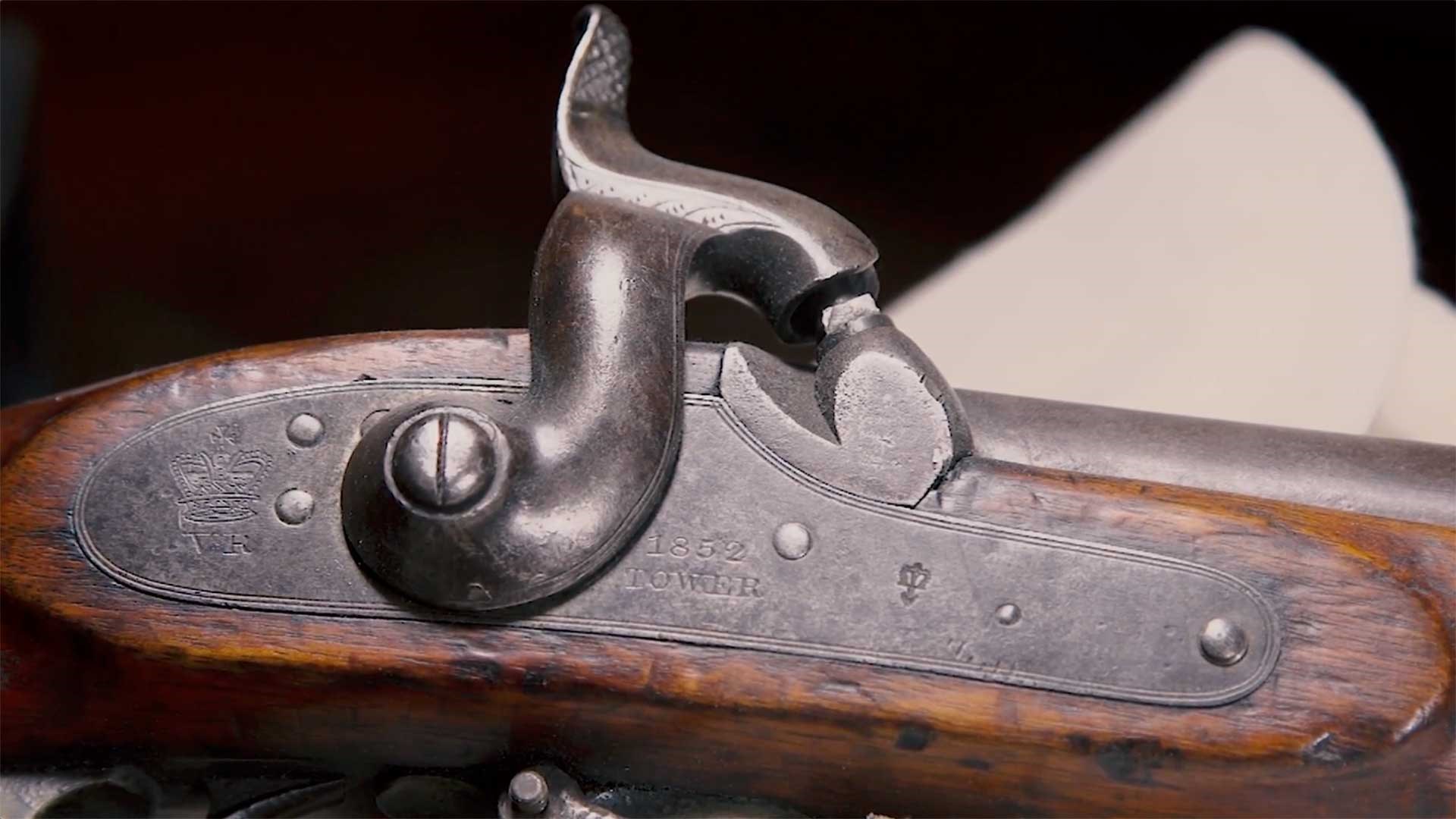 Gray lockplate and hammer of the Pattern 1851 Minie Rifle.