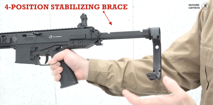 GHM9 pistol in a shooter&#x27;s right hand and text on image calling out the four-position stabilizing brace.