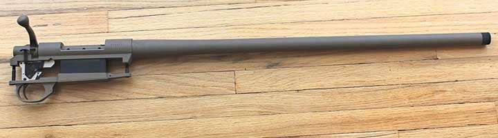 The Howa barreled-action chambered in 6.5 mm Creedmoor with flat dark earth Cerakote finish.