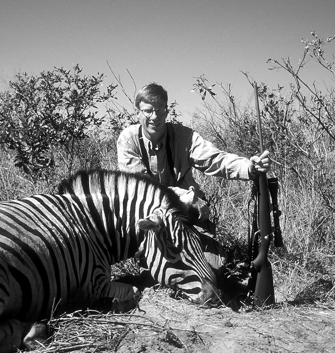 man hunter outdoors rifle zebra hunting animals africa safari