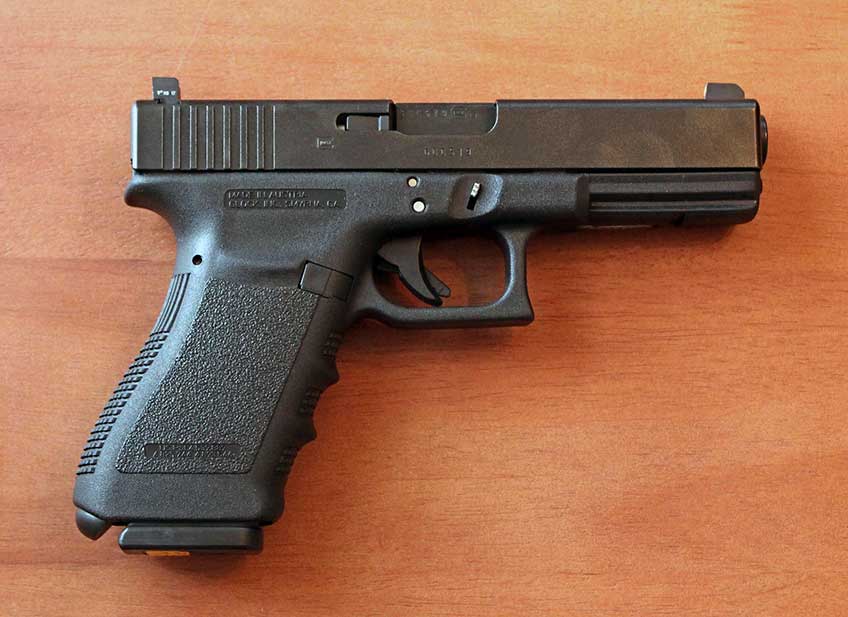 right side glock pistol handgun semi-automatic black plastic metal