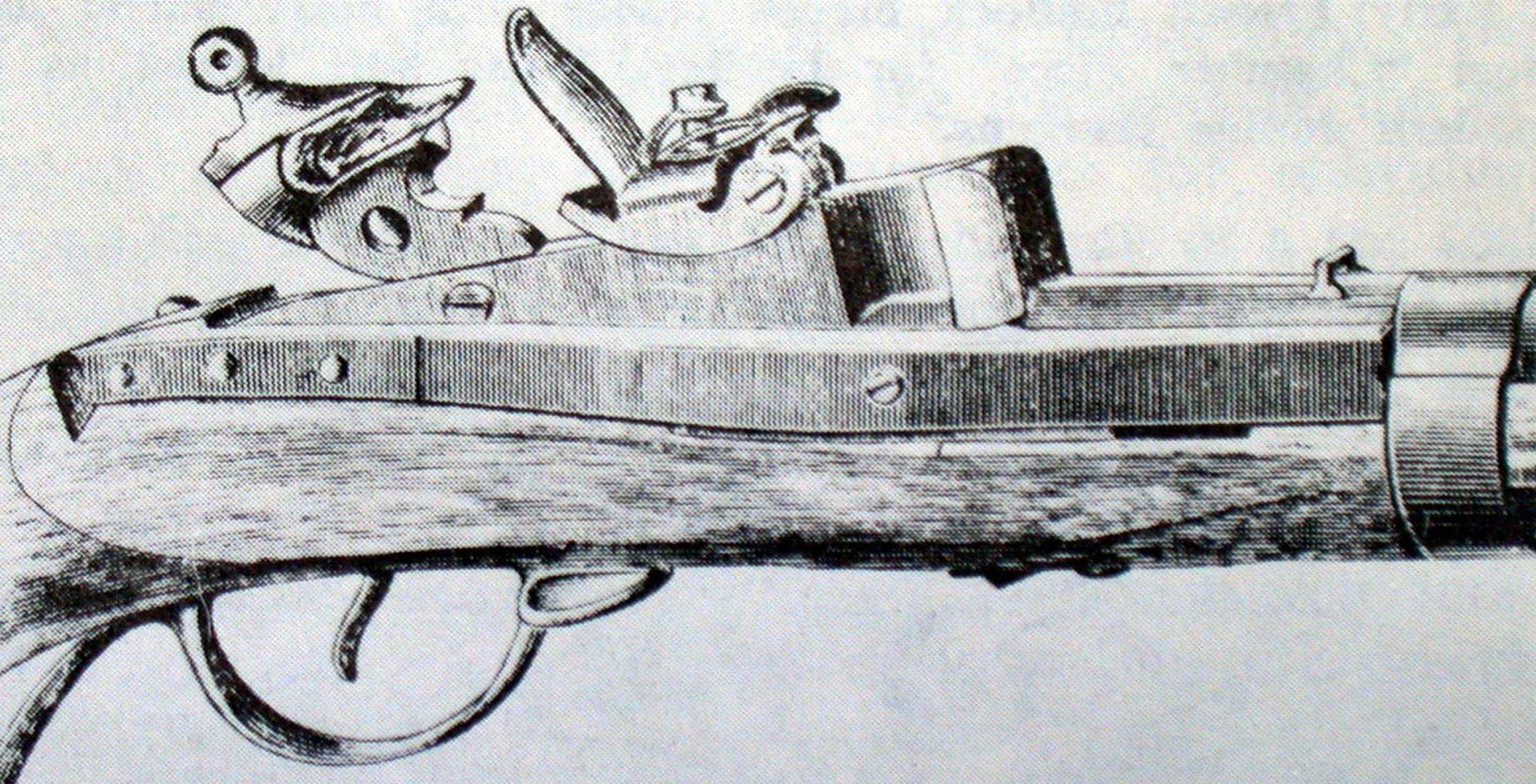 Shown above is a photo of a contemporary drawing of the 1819 Hall Rifle with its breech open. Image courtesy of Wikimedia Commons.