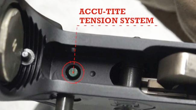 View inside lower receiver of AR-15 with text highlighting the Springfield Armory Accu-Tite tension screw.